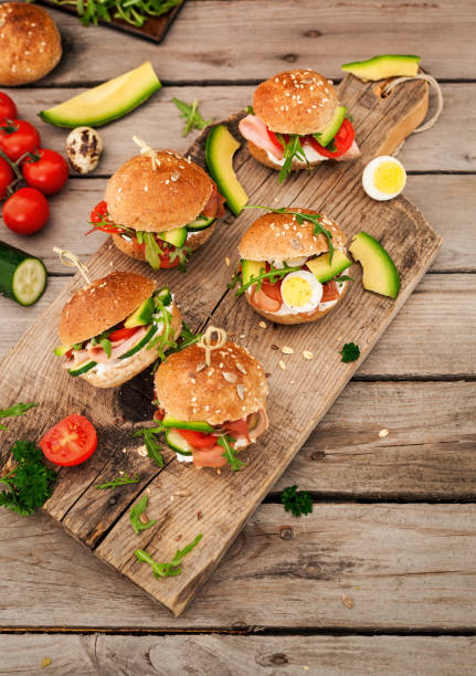 istock Mini Sandwiches With Arugula, Tomato,Avocado,Cucember And Cream Cheese 939291558