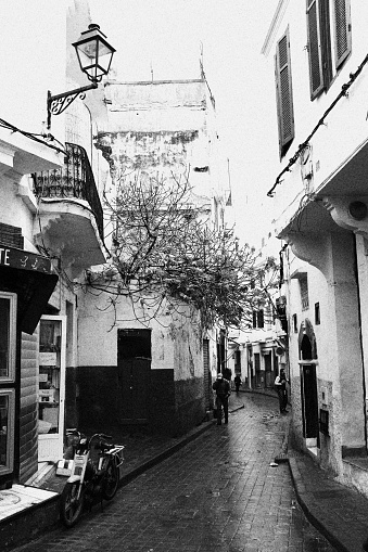 This picture shows a typical messy and dirty street in the vicinity of the old Souq in Casablanca’s old city center, Morocco.