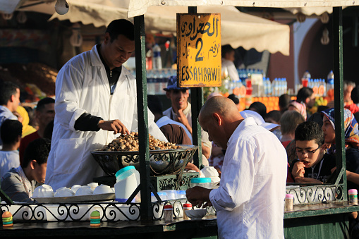 Snails for sale on the big market on the Jemaa el-Fnaa Square in Marrakesh, Morocco.