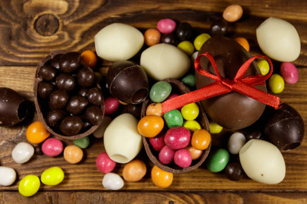 istock Easter composition with chocolate eggs on wooden background 939300504