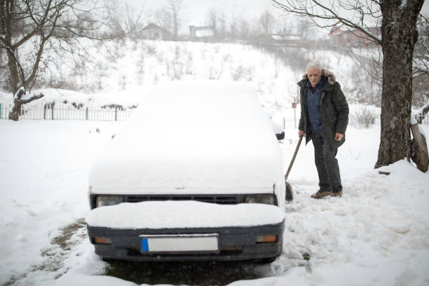 istock Stuck in snow. Man with shovel removing snow 939300624