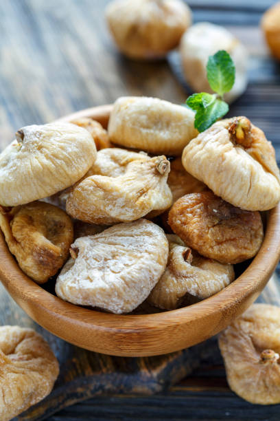 istock Dried figs in a bowl closeup. 939303462