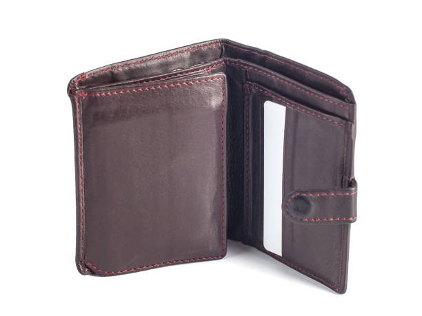 istock Old brown leather wallet isolated on white background 939307256