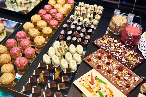istock Cakes and sweets in the shop window 939313896