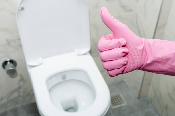 istock Hand with glove showing thumb up 939318302