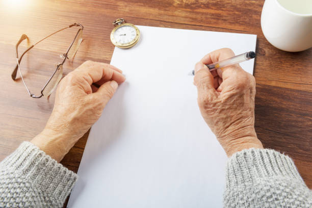 istock Old grandmother writing letters 939321550