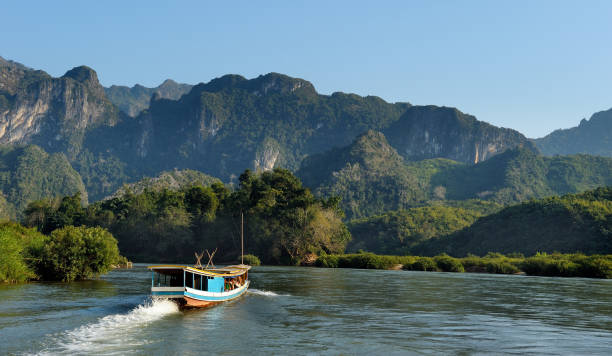 Tourist boat on Mekong. Beautiful landscape with boat tour at Mekong river near Luang Prabang in Laos. indochina stock pictures, royalty-free photos & images