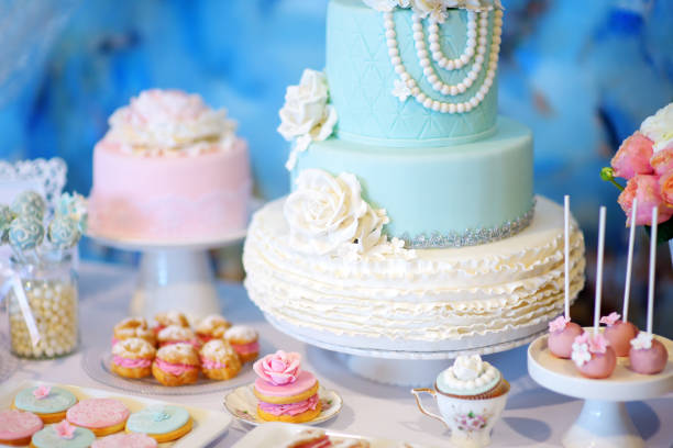 istock Beautiful desserts, sweets and candy table at wedding reception 939329084