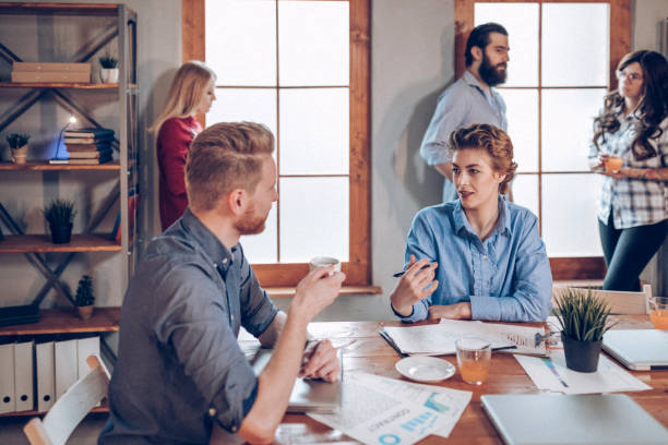 istock Co-workers discussing about new business ideas 939341654