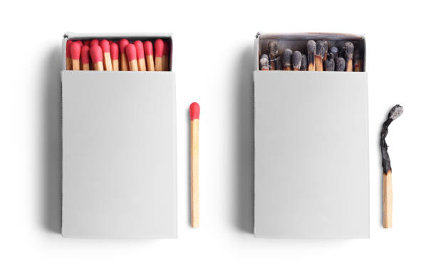 istock Top view of opened match boxes with burned matchsticks. Isolated on white background 939342528