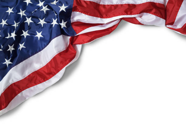 istock Closeup ruffled American flag isolated on white background 939342686