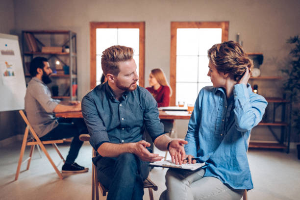istock Co-workers discussing about new business ideas 939342802