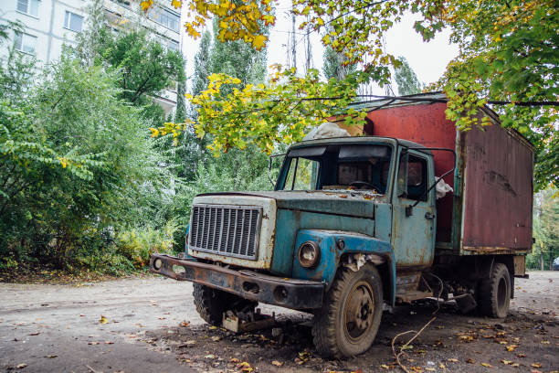 istock Old rusty truck at abandoned industrial area 939345822