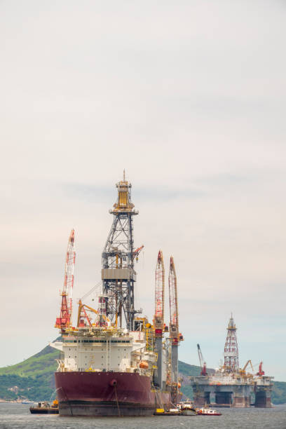 istock Oil rig and support vessel on offshore area 939349828