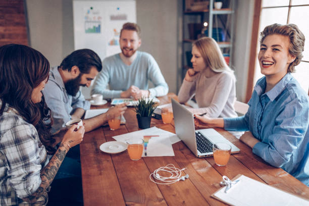 istock Co-workers discussing about new business ideas 939355598