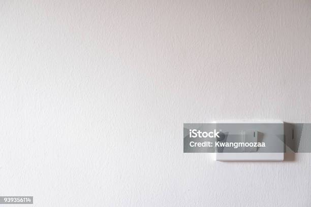 Light Switch On White Concrete Wall Stock Photo - Download Image Now - Dimmer Switch, Architecture, Bright