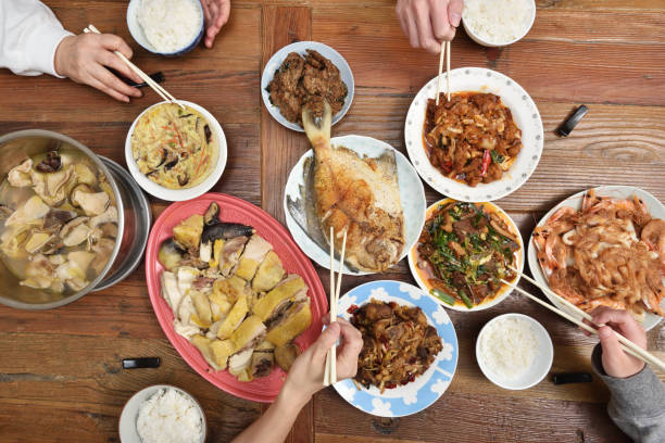 istock Chinese family enjoying dinner 939369218
