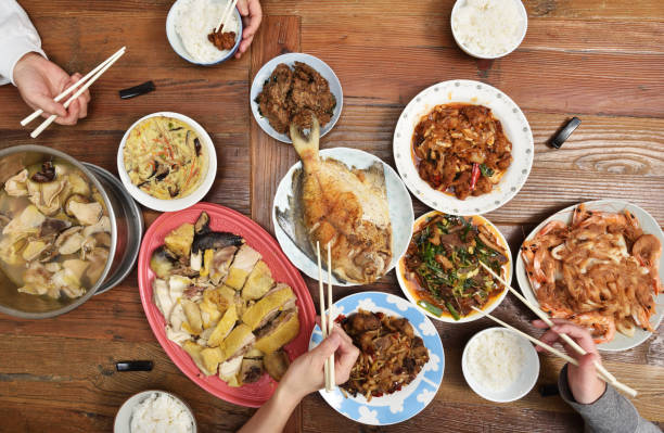 istock Chinese family enjoying dinner 939369228