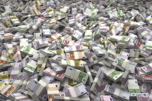 Money Pile Bundles of Euro Notes laid out in a massive pile. Millions and Millions of Euros.
