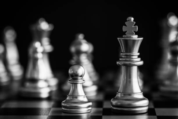 istock Strategy chess battle Intelligence challenge game on chessboard. Success the strategy concept. Chess business leader and success idea. Chess strategy game business competition success play. 939379980