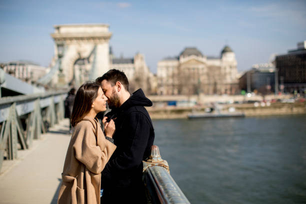 istock Loving couple on Chain bridge, Budapest 939395680