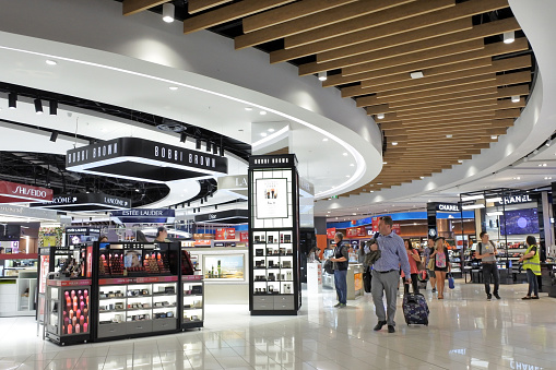 Passengers passing through the new Auckland airport International departure duty free area. More then 10 million passengers use Auckland international terminal each year
