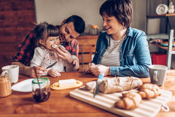 istock Morning in kitchen with family 939433574
