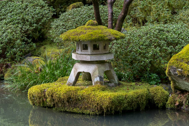 istock Lantern with Green Plants Moss Japanese Garden Oregon Waters Edge 939450132