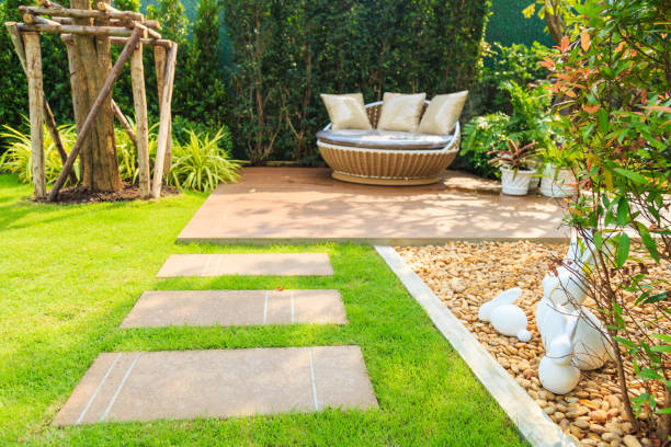 Stone pathway on lawn in the garden.