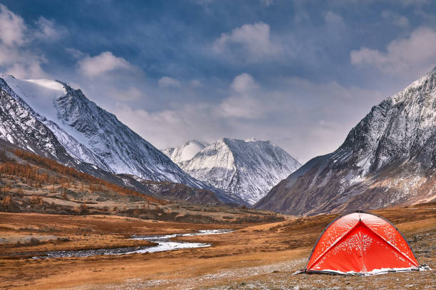 istock First snow on Lake. Colorful autumn landscape 939457374