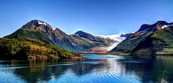 Panorama view to Nordfjorden and Svartisen glacier at Meloy, Norway