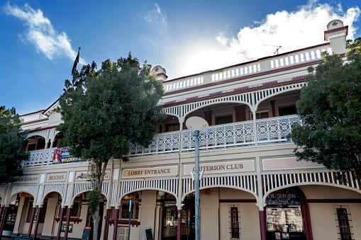 View of the elegant Criterion Hotel, built in 1917, and its distinctive lattice work, decorative iron lace and shamrocks on the parapets, in Warwick, Australia