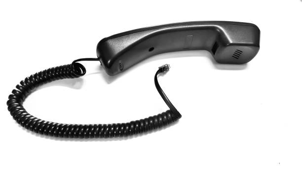 istock line and telephone handset isolated on white background. 939477380