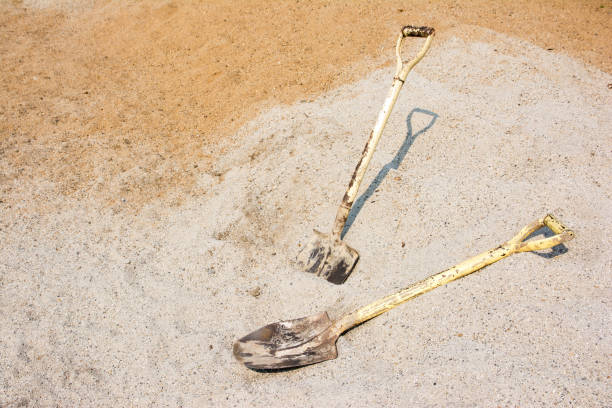 istock It is two old shovel at pile of sand background 939486220