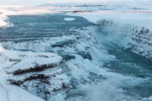 istock magnificent icelandic landscape with Gullfoss waterfall and snow-covered rocks 939488660