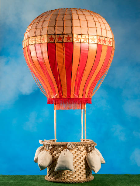 istock Children's Hot-air Balloon on Sky Blue Background 939490428