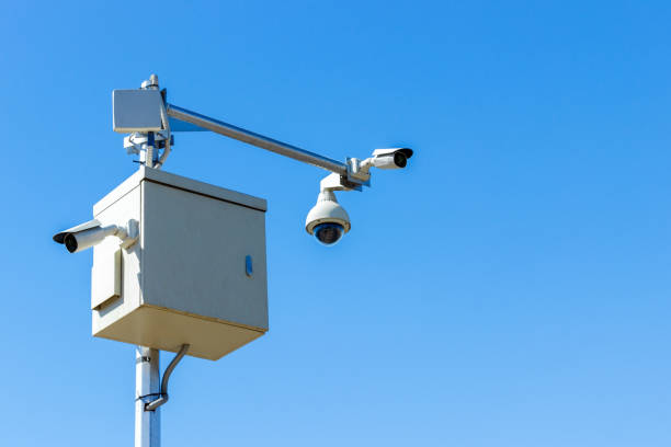 istock cctv camera on sky background Infrared camera and zoom tracking system 939494498