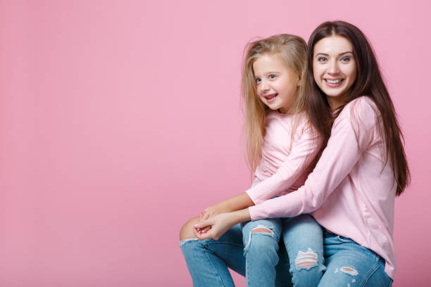 istock mother and daughter together 939496930