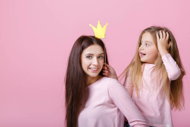 istock mother and daughter together 939497154