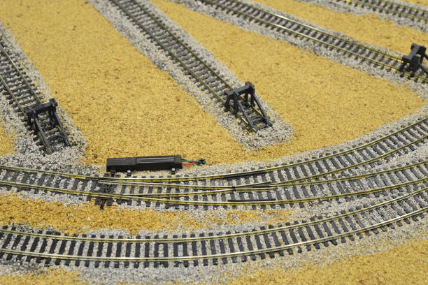 istock Electric points on a model railway desert landscape 939502494