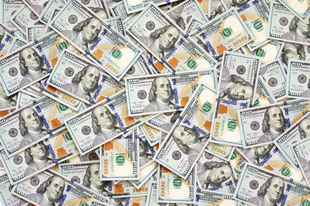 istock Pile of dollar bills 939538988