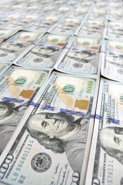 istock Rows of new design dollar bills 939539070