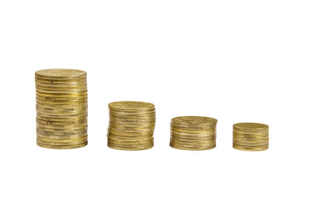 istock Stacks of golden coins isolated on white background 939543344