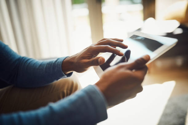 istock Updating all his apps for better connections 939548598