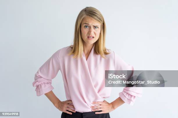 Portrait Of Displeased Young Businesswoman Stock Photo - Download Image Now - Women, Displeased, One Woman Only