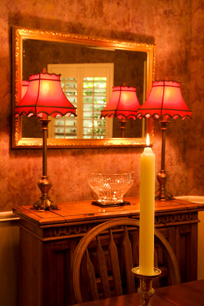 istock Burning candle the dining table lamps on buffet soft focus. 93955245