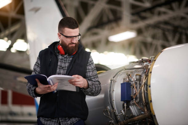 istock Aircraft mechanic in the hangar 939562188