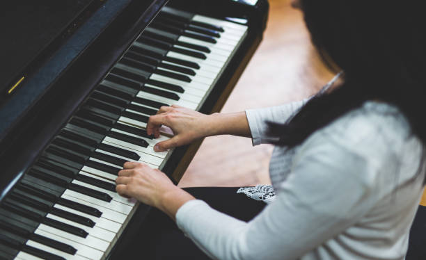 istock Profesional pianist playing on the piano 939566388