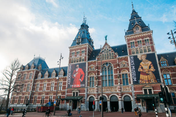 Amsterdam , Netherlands - : People walk through underpass of Rijksmuseum (State Museum).It is a Netherlands national museum dedicated to arts and history in Amsterdam.