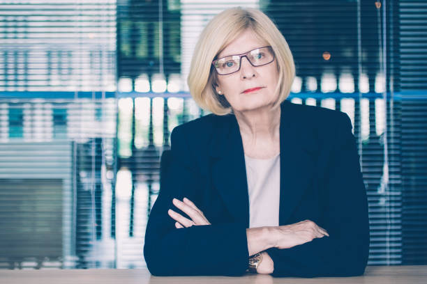 istock Concentrated woman participating in conference 939572466